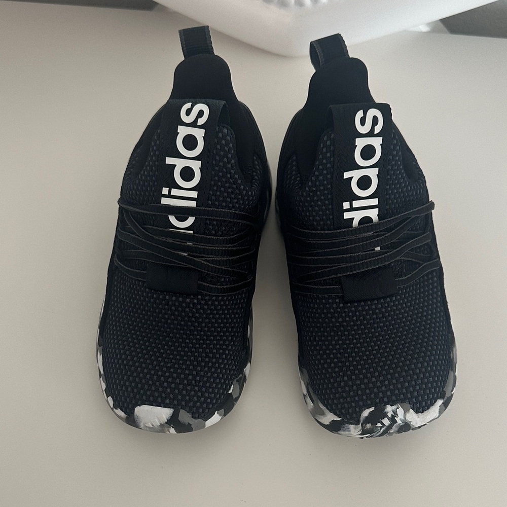 Adidas Kids' Lite Racer Adapt 7.0 slip-on shoes.